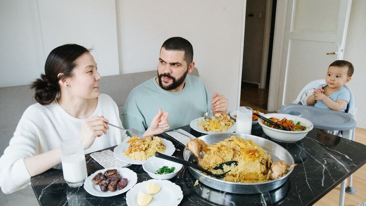 A family sharing a meal at home, highlighting connection and togetherness.
